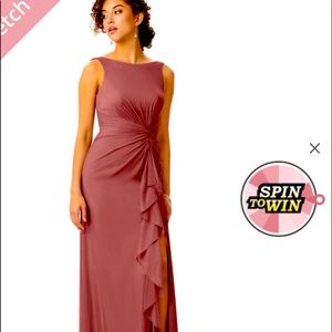 Never worn. Beautiful dress!